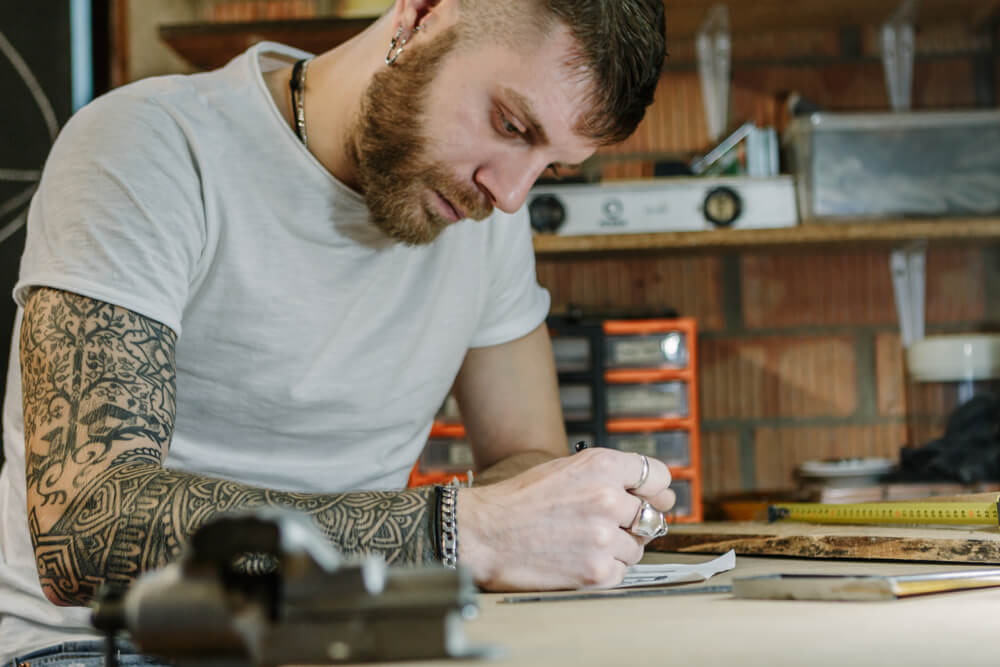 Craftsman artist making a new designer wooden product