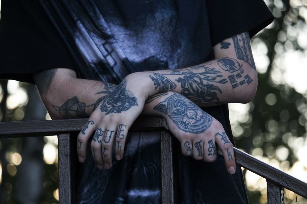 Tattoo Hands Young Stylish People